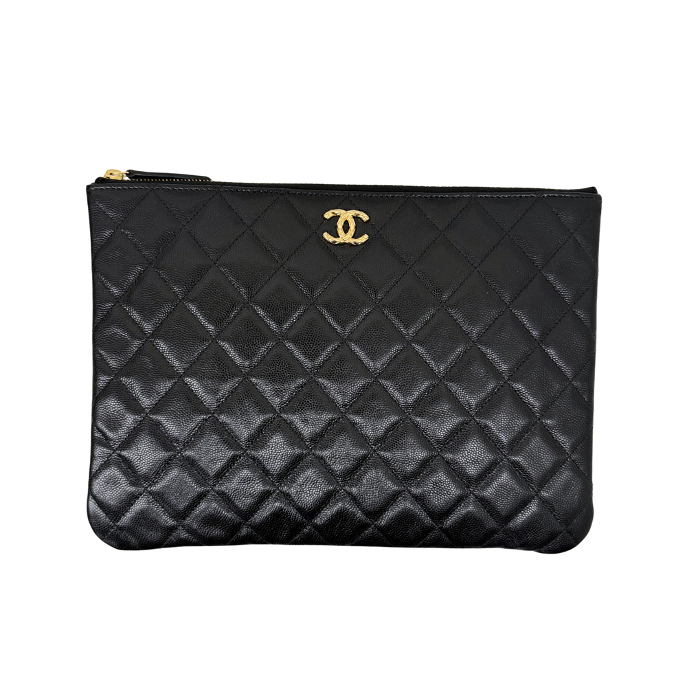 Black Chanel quilted clutch with gold-tone CC logo and top zipper