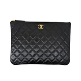 Chanel black clutch with quilted gold-tone CC logo microchipped (pre-owned)