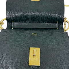 Green leather Drew shoulder bag front with gold logo plate and snap tab