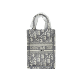 Dior monogram mini tote bag with CHRISTIAN DIOR PARIS band on front