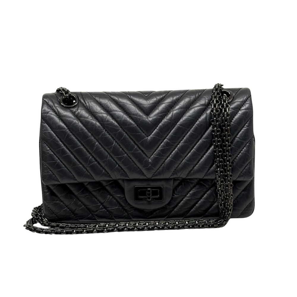 Chanel black chevron quilted flap shoulder bag with chain strap and turn-lock