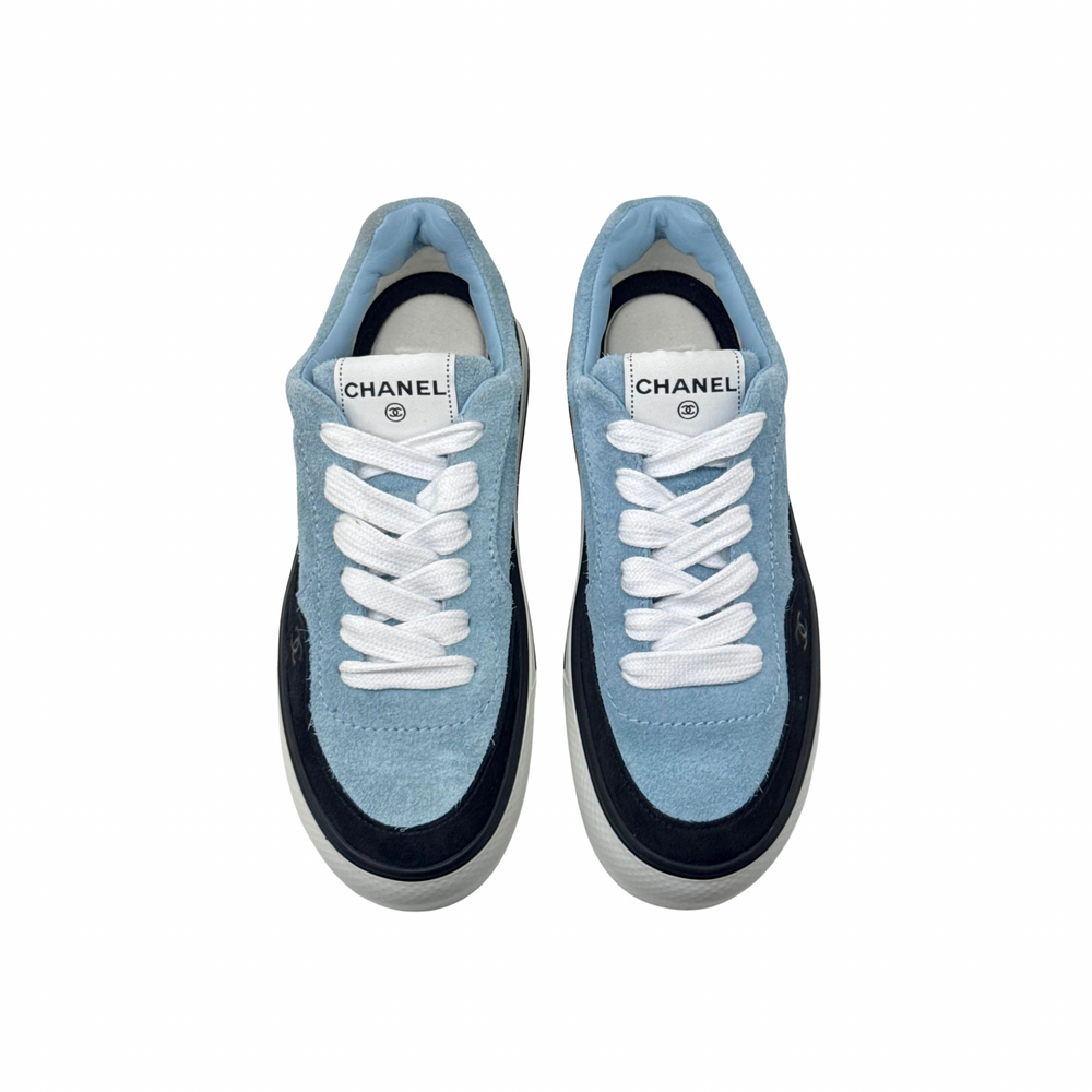 Blue suede sneakers with CHANEL logo tongue and white lace-up front