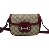 Burgundy leather strap GG monogram crossbody bag with front buckle