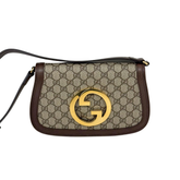 Gucci GG canvas crossbody bag with gold double-G front logo and brown strap