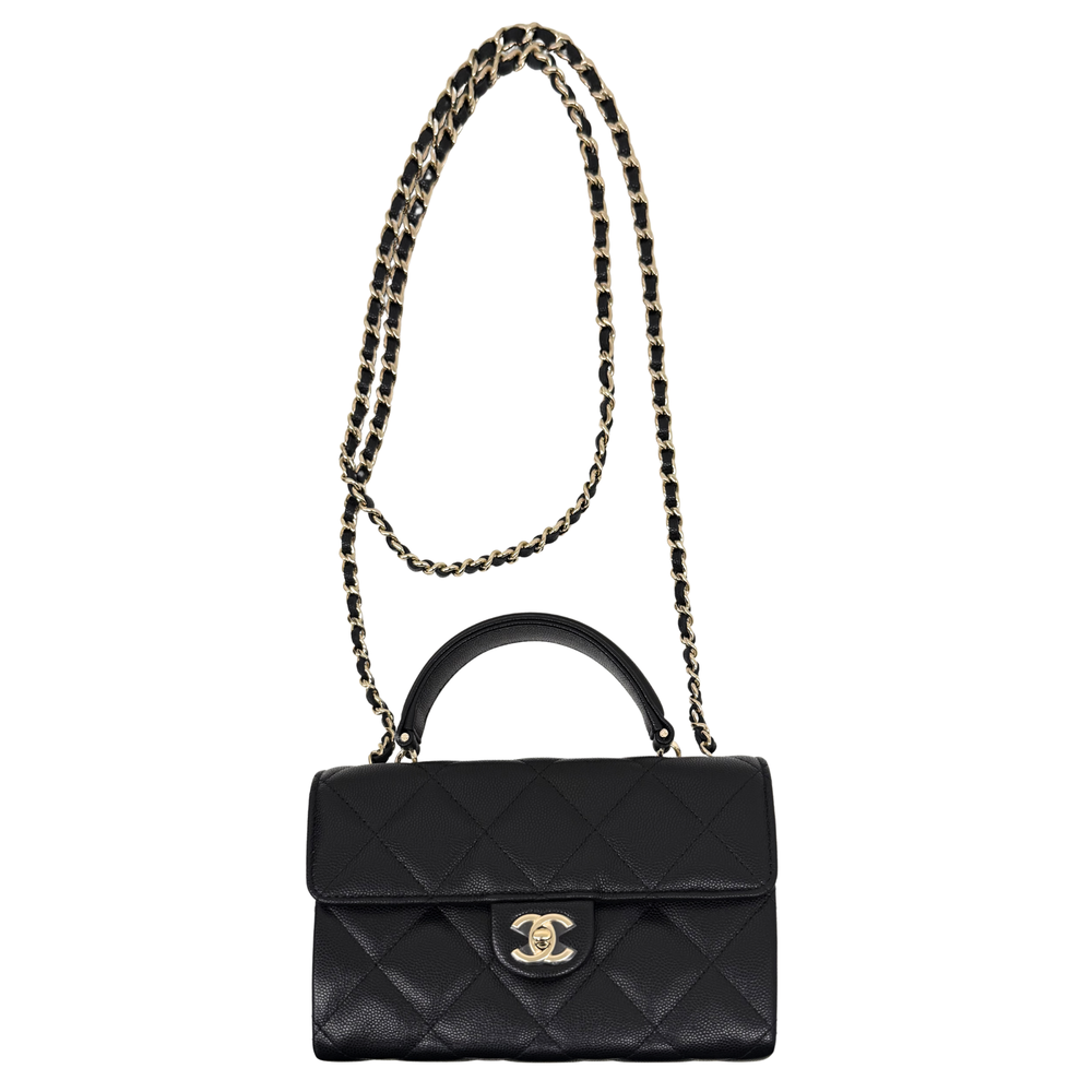 Black quilted caviar-leather handbag with chain shoulder strap and flap closure