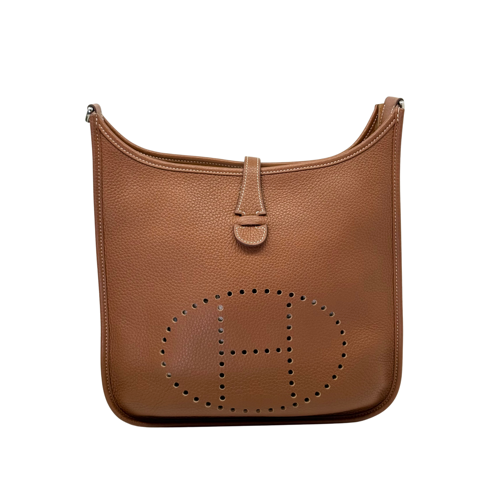 Evelyne III 29 PM shoulder bag front, gold textured leather with large dotted 'E' motif
