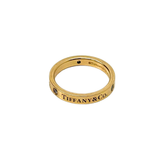 Pre-owned Tiffany & Co. yellow gold ring band with engraved interior and side holes