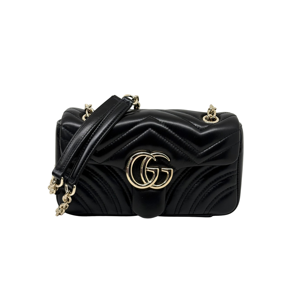 Gucci black quilted leather shoulder bag with GG logo and gold chain strap