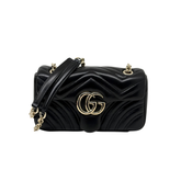 Gucci black quilted leather shoulder bag with GG logo and gold chain strap