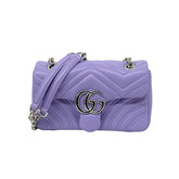 Lavender quilted crossbody bag with GG logo, top handle and chain strap
