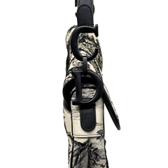 Christian Dior saddle bag side strap with black leather buckle and toile-covered strap base.