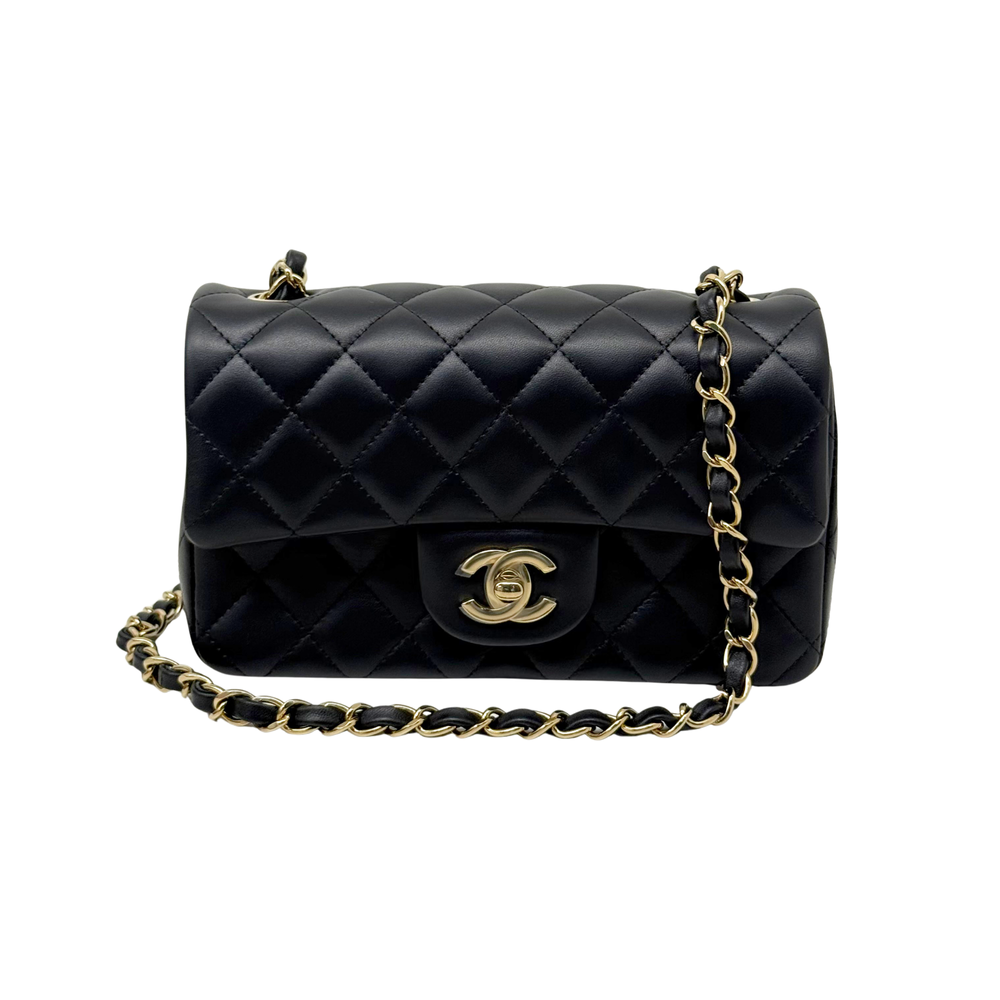 Chanel black mini classic handbag with quilted pattern, gold chain strap, CC turn-lock flap