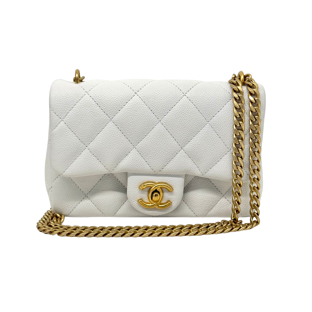 Chanel white quilted mini sweetheart flap bag front with gold chain strap and emblem