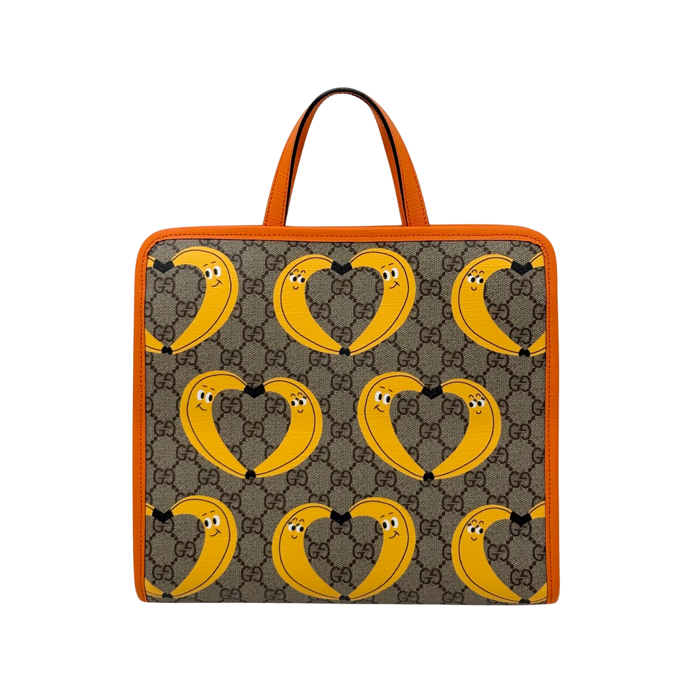 Kids' GG Supreme tote bag with repeating banana print, orange handles and trim