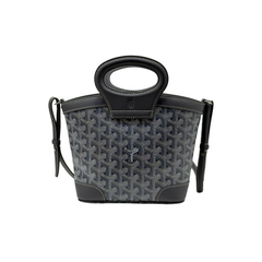 Pre-owned Goyard bag front view with patterned canvas, top handle, and side ties
