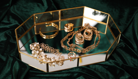 How Does 18k Gold Tarnishing Differ from Plated Metal on Vintage Designer Jewelry?