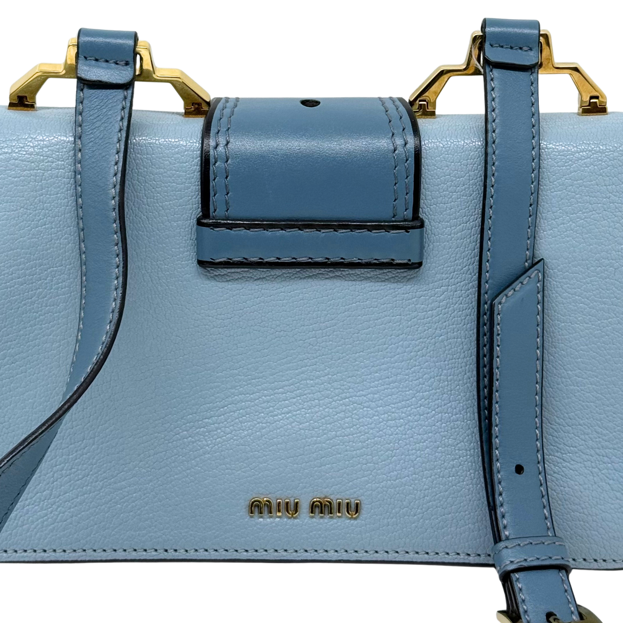 Pre-owned Miu Miu handbag, light blue flap with top clasp and gold-tone hardware
