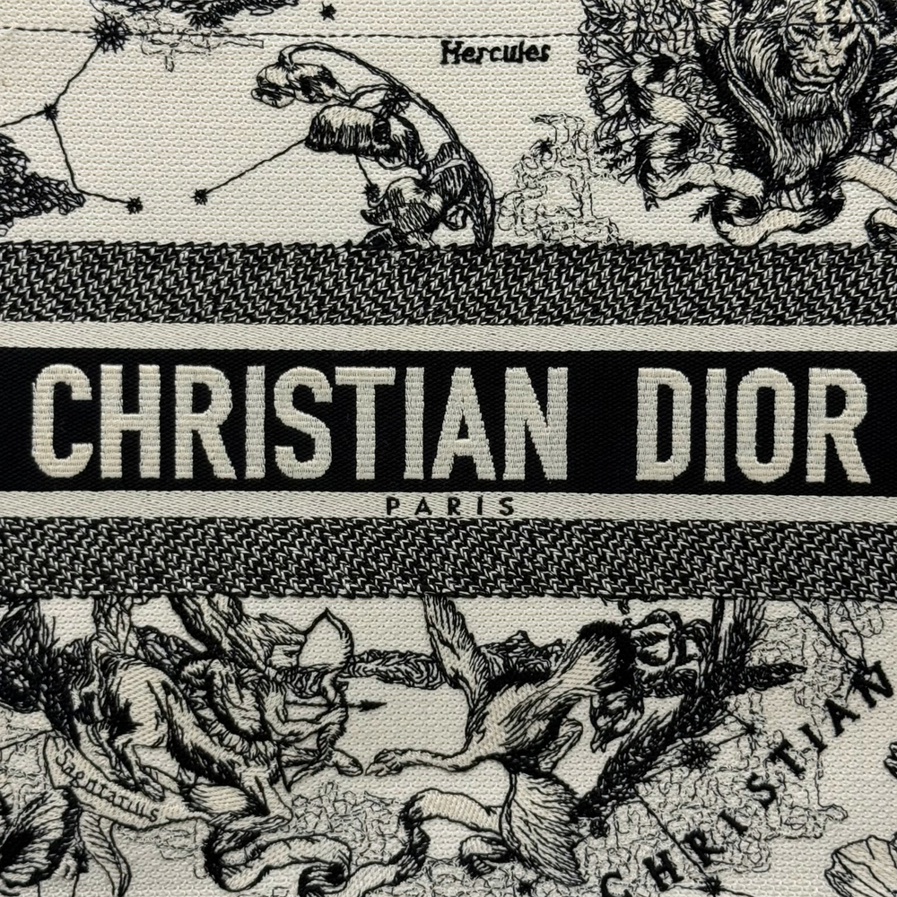Dior tote bag with lion-engraving print and CHRISTIAN DIOR PARIS band