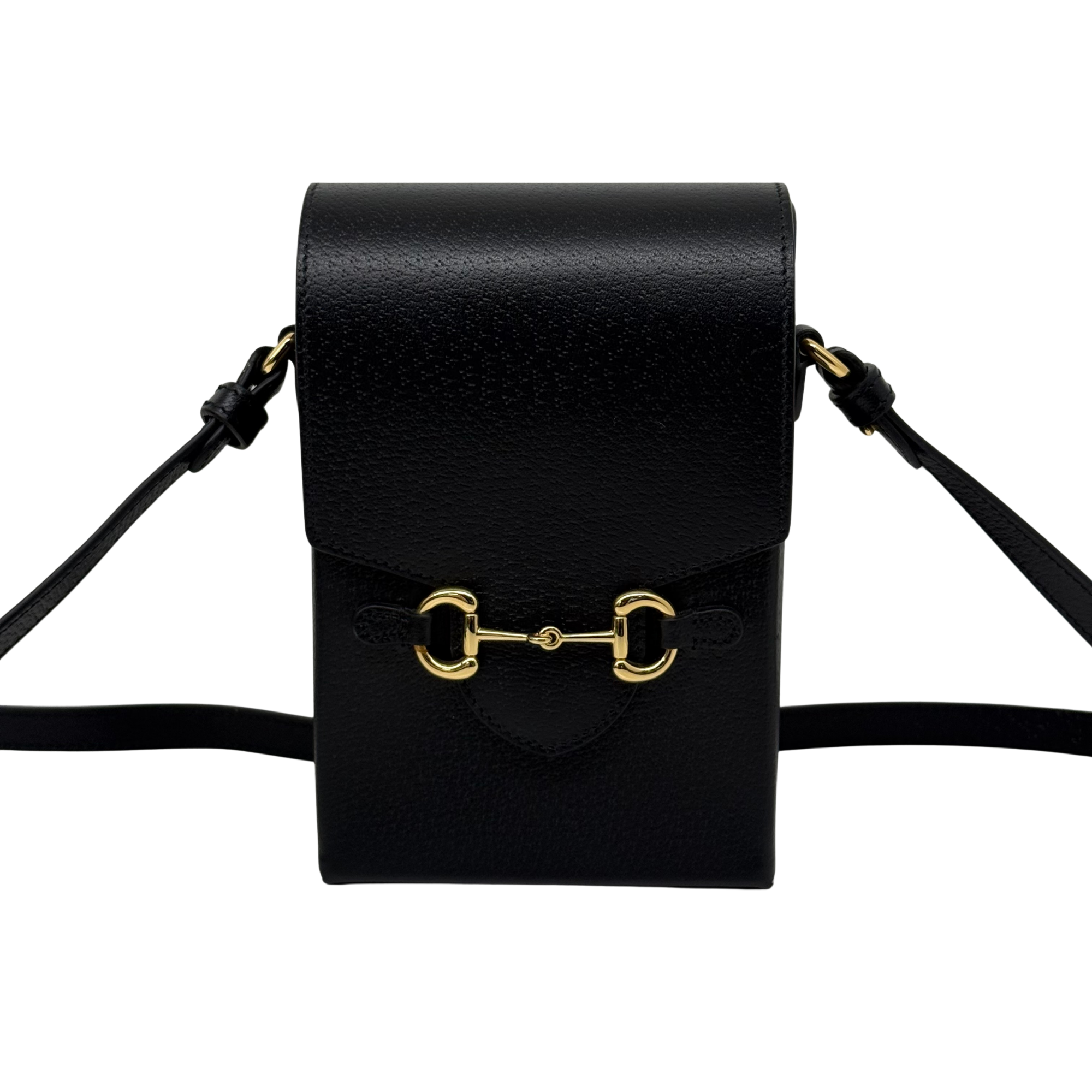 Black leather crossbody bag front flap and shoulder strap