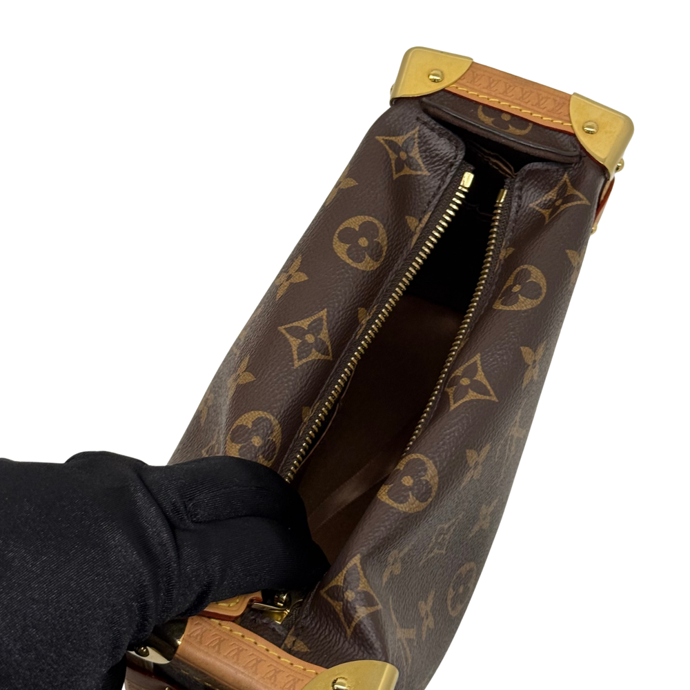 Louis Vuitton monogram mini bag with open top, visible zipper interior and tan leather trim