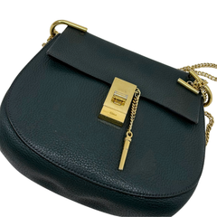 Green leather Drew shoulder bag with flap, gold lock, and chain shoulder strap
