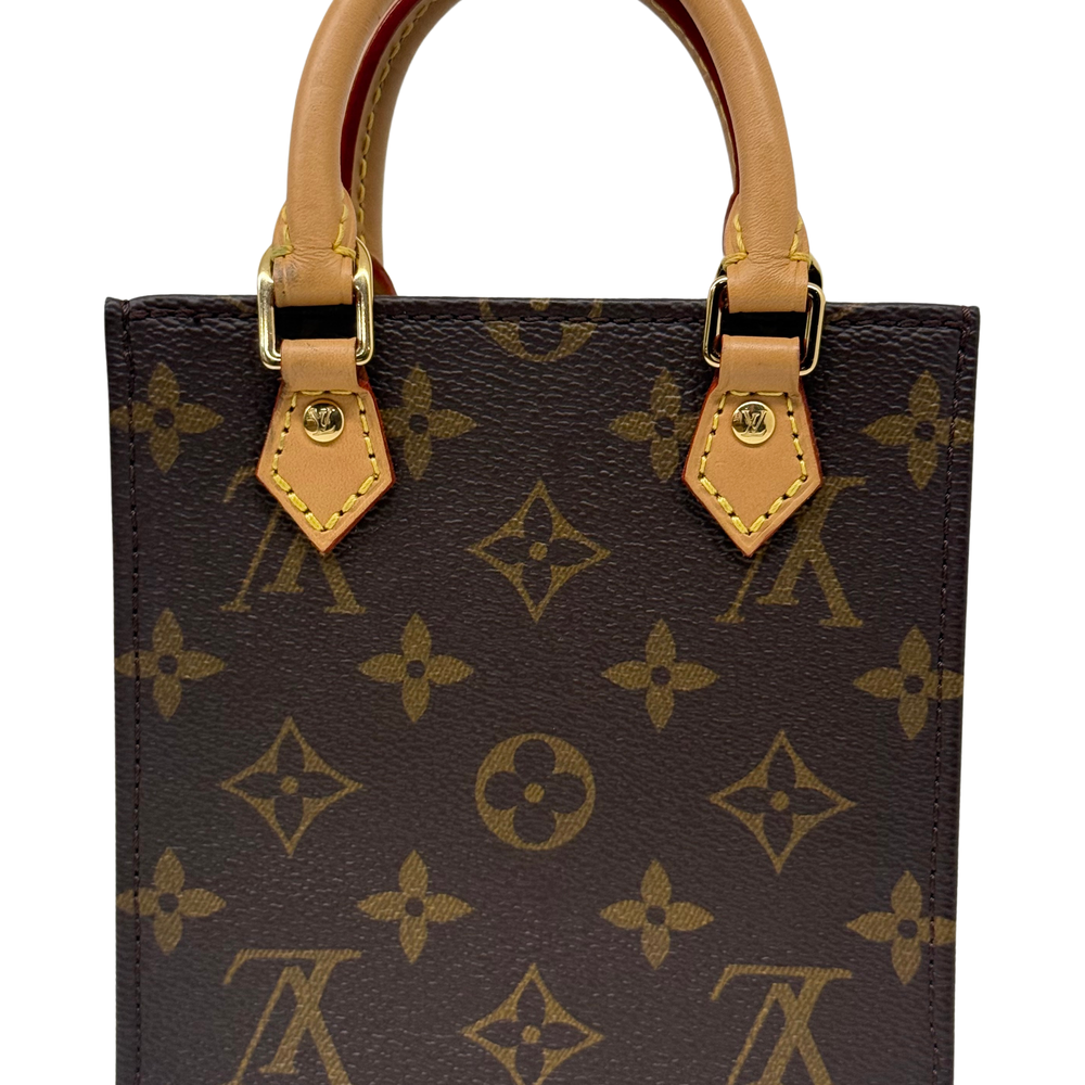Pre-owned Louis Vuitton monogram handbag close-up front view with gold-tone handle straps