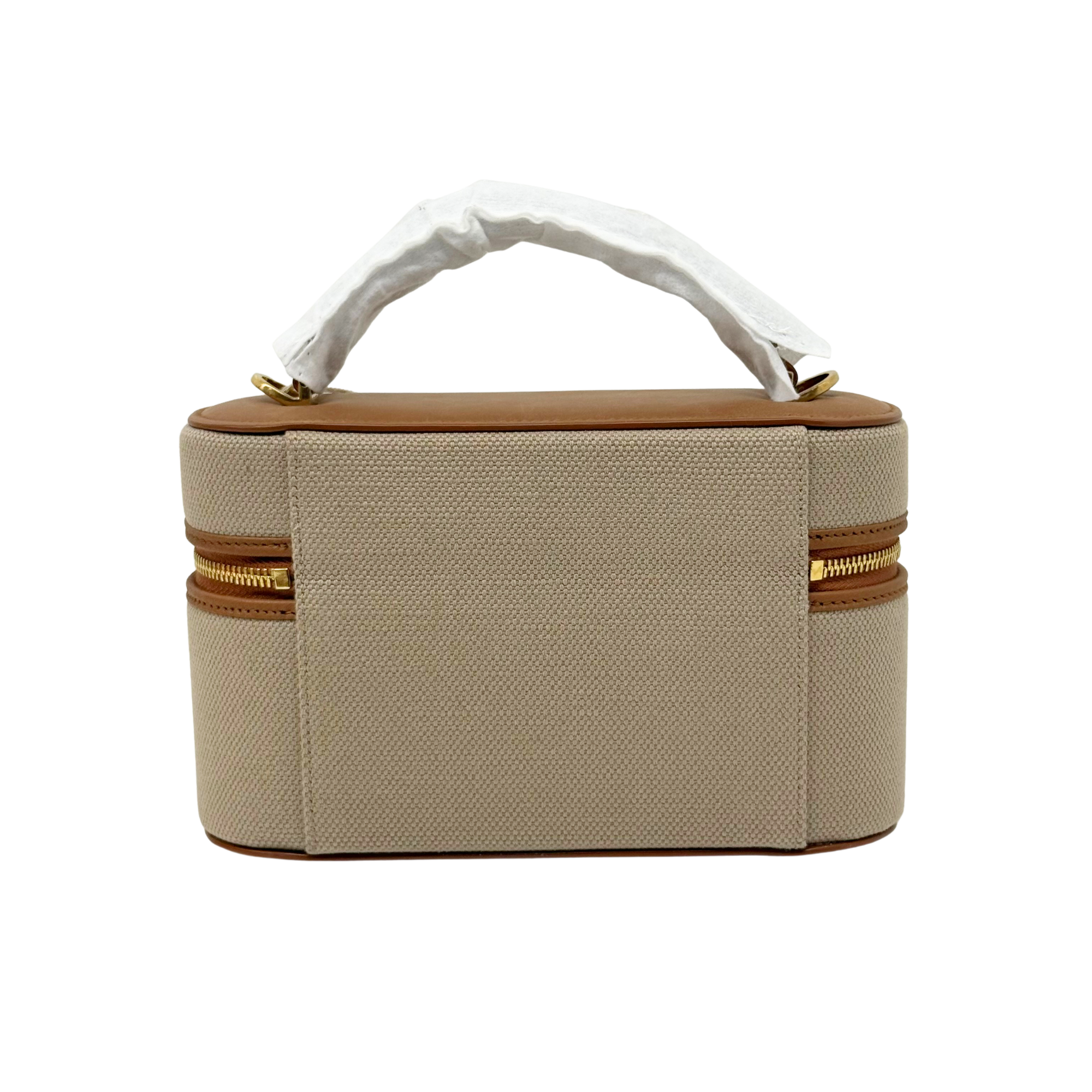 Beige vanity bag front view with brown trim and fabric top handle