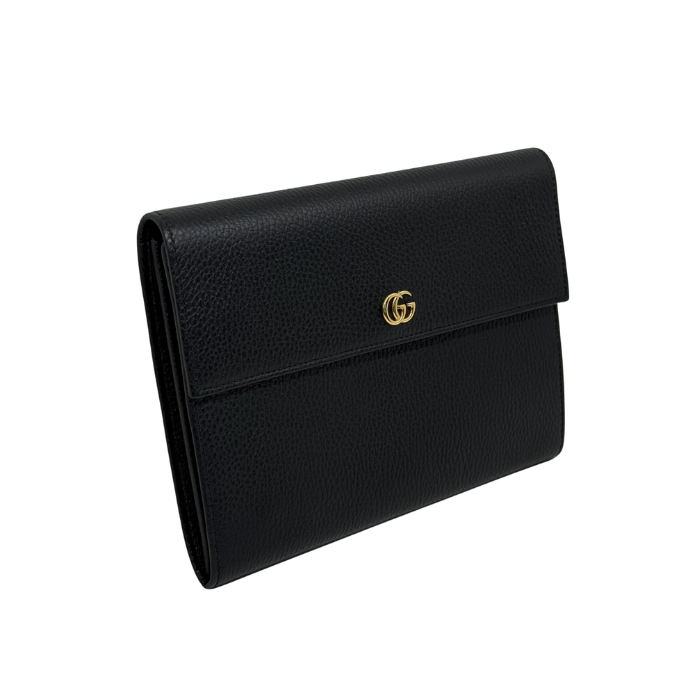 Black Gucci leather wallet with gold double-G emblem and flap front