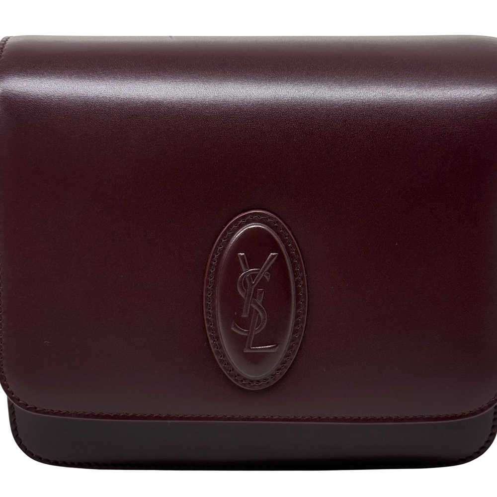 Saint Laurent Le 61 Besace bag front close-up with oval embossed YSL logo