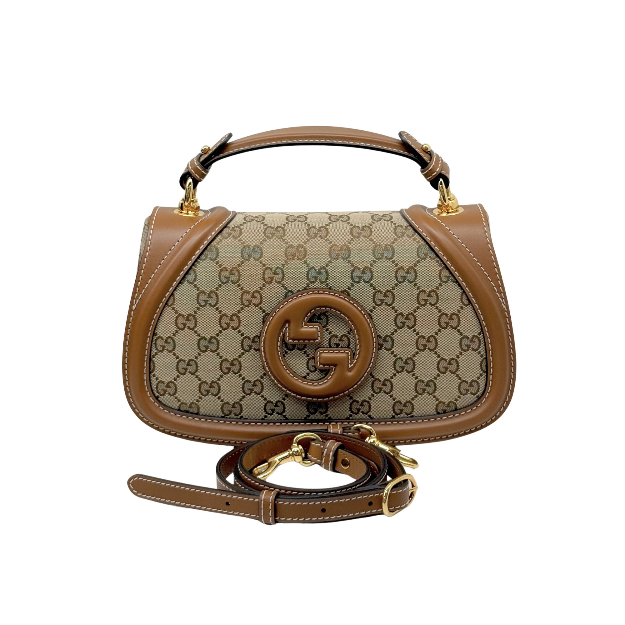 Gucci small handbag with GG canvas front, brown leather handle, and detachable strap