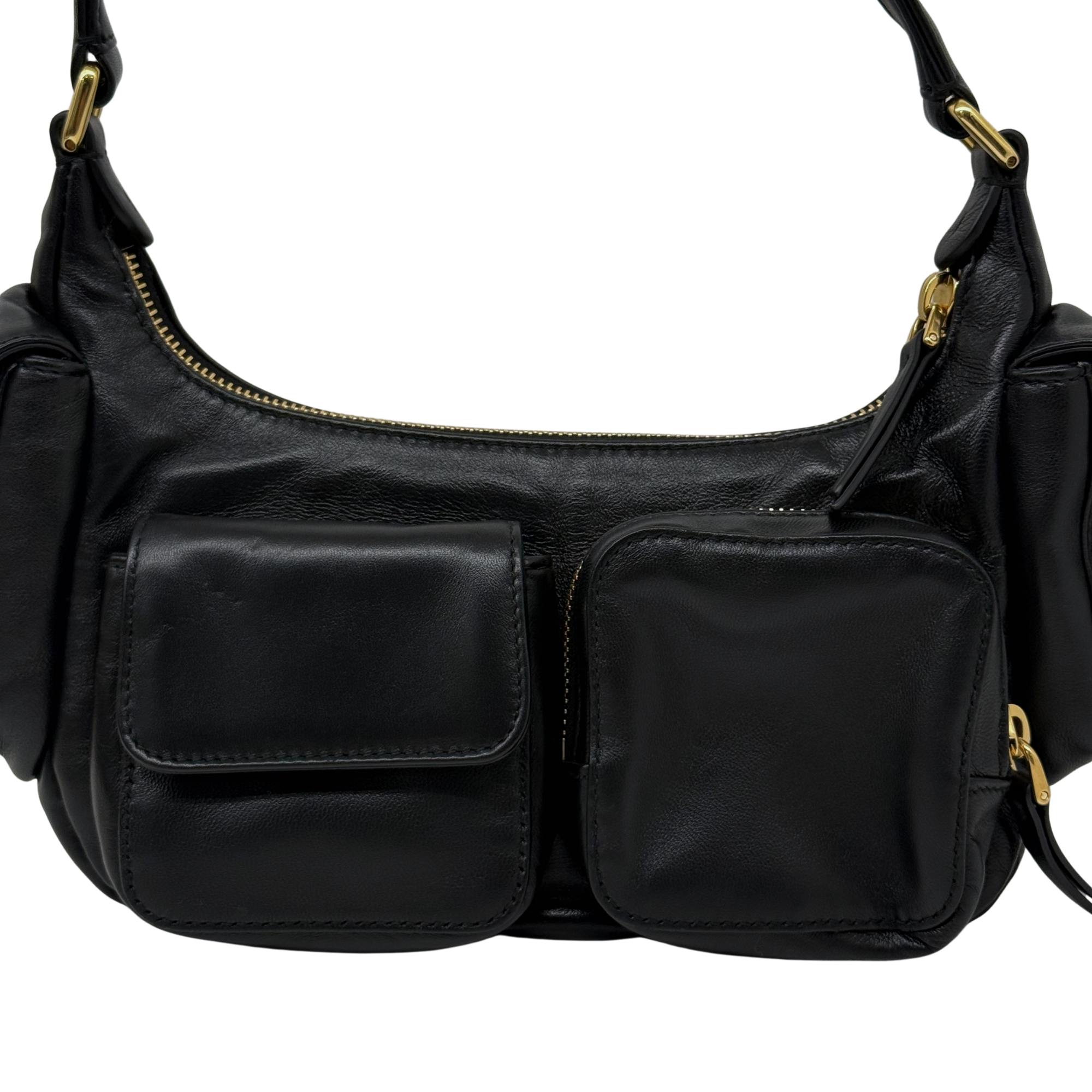 Black leather shoulder bag front with two stitched patch pockets and gold zipper trim