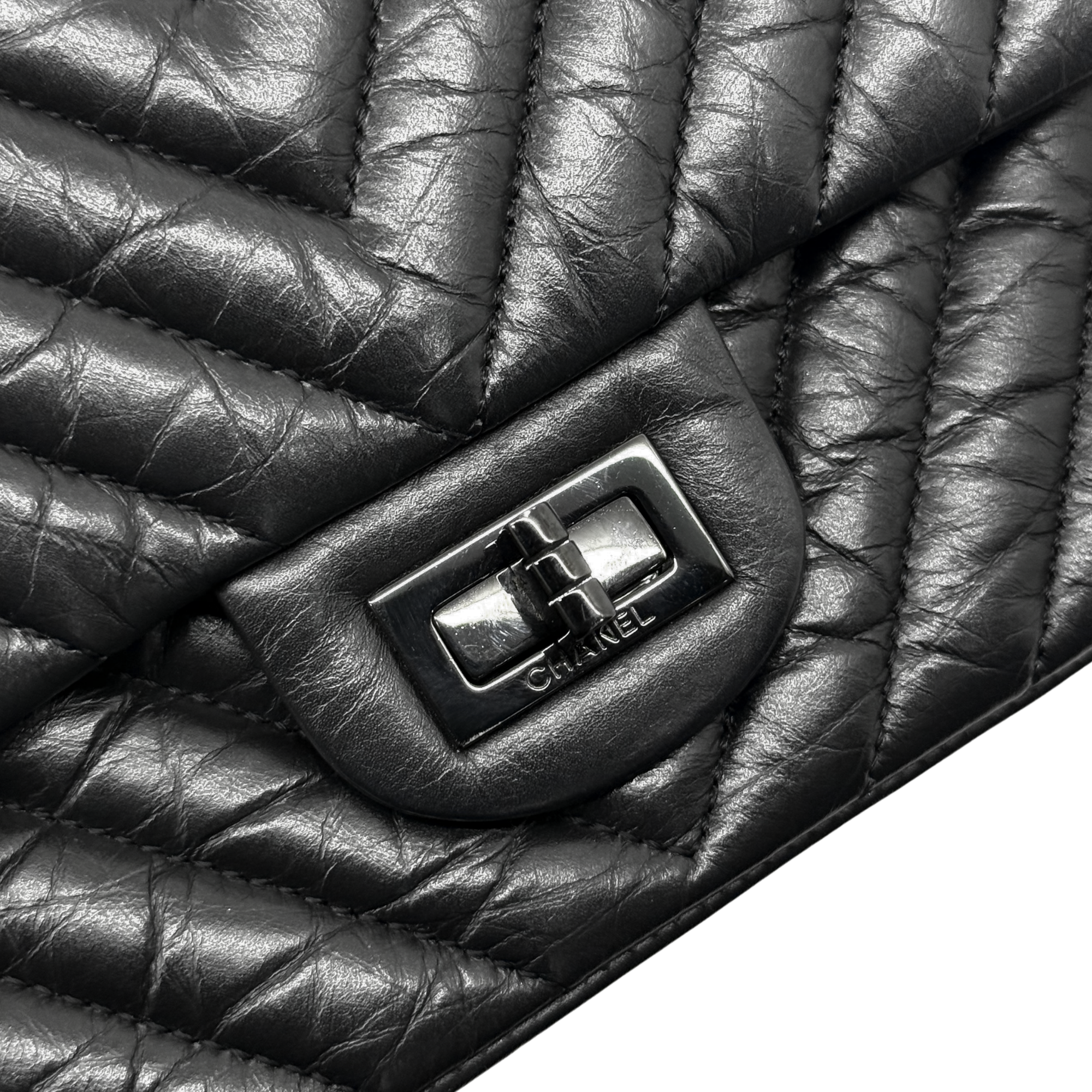 Chanel black bag black hardware triangle