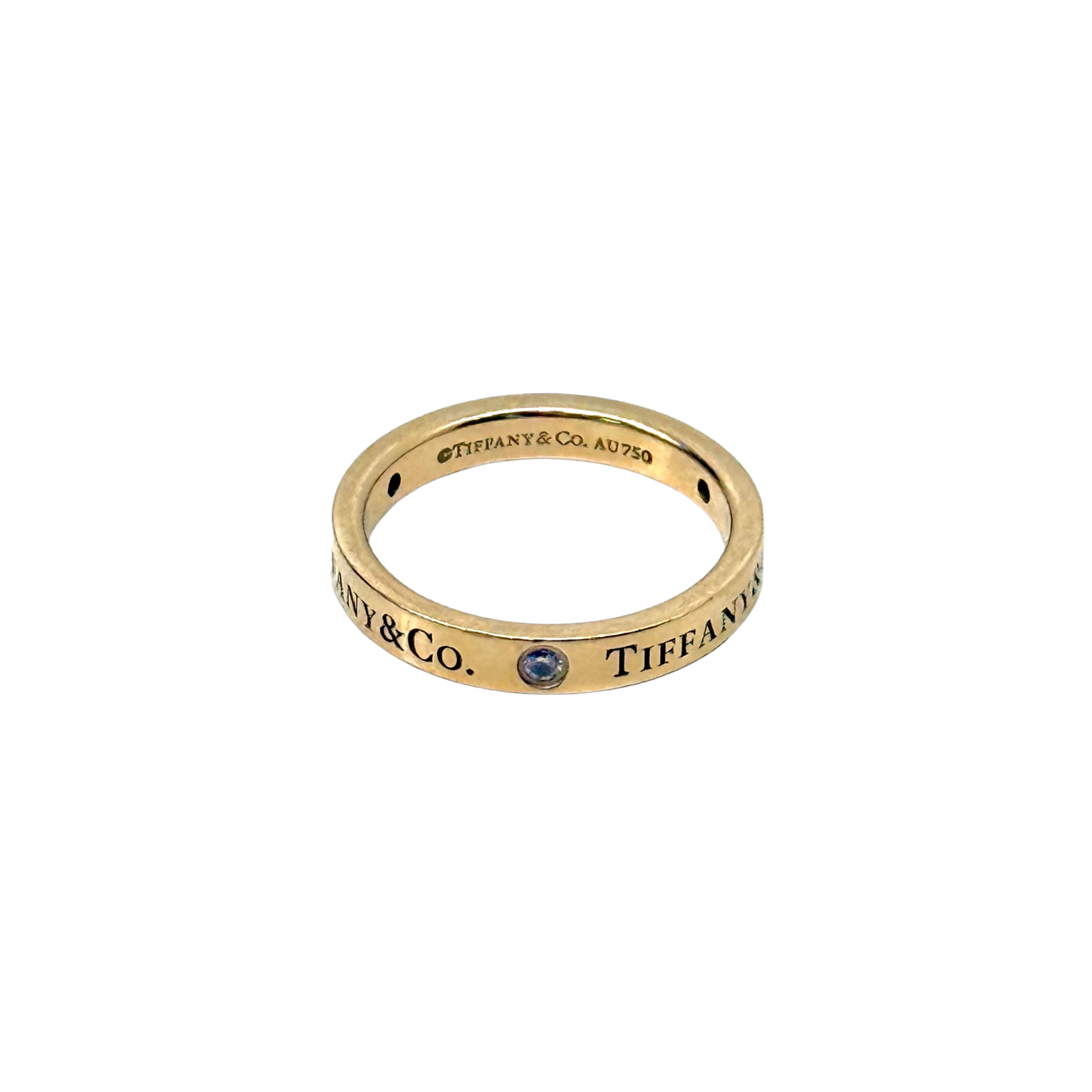 Pre-owned Tiffany & Co. yellow gold band ring with blue gemstone and AU750 marks