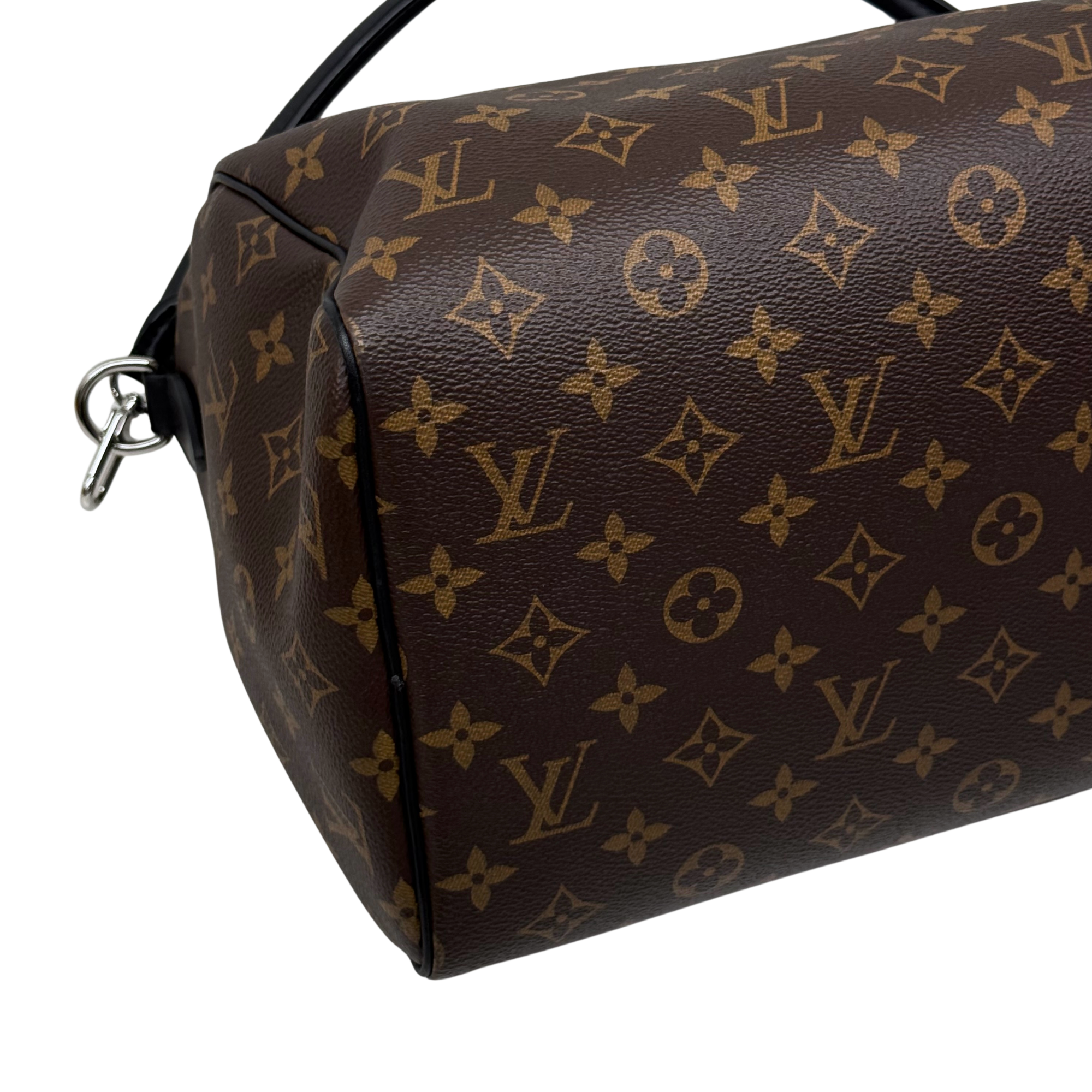 Louis Vuitton pre-owned monogram duffel bag side with black piping and metal zipper pull