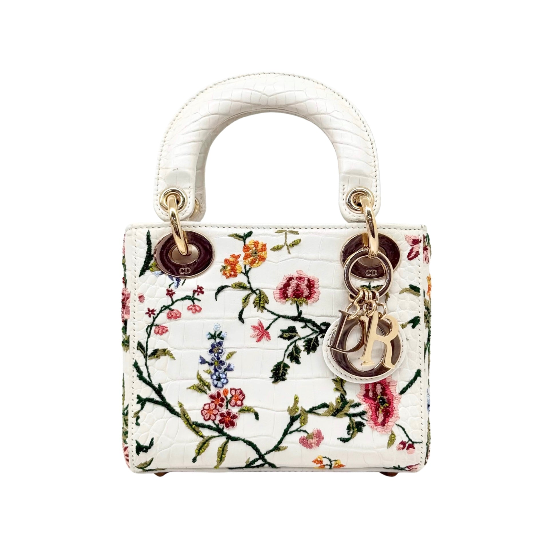 Pre-owned mini handbag with white leather floral print, single top handle, gold hardware