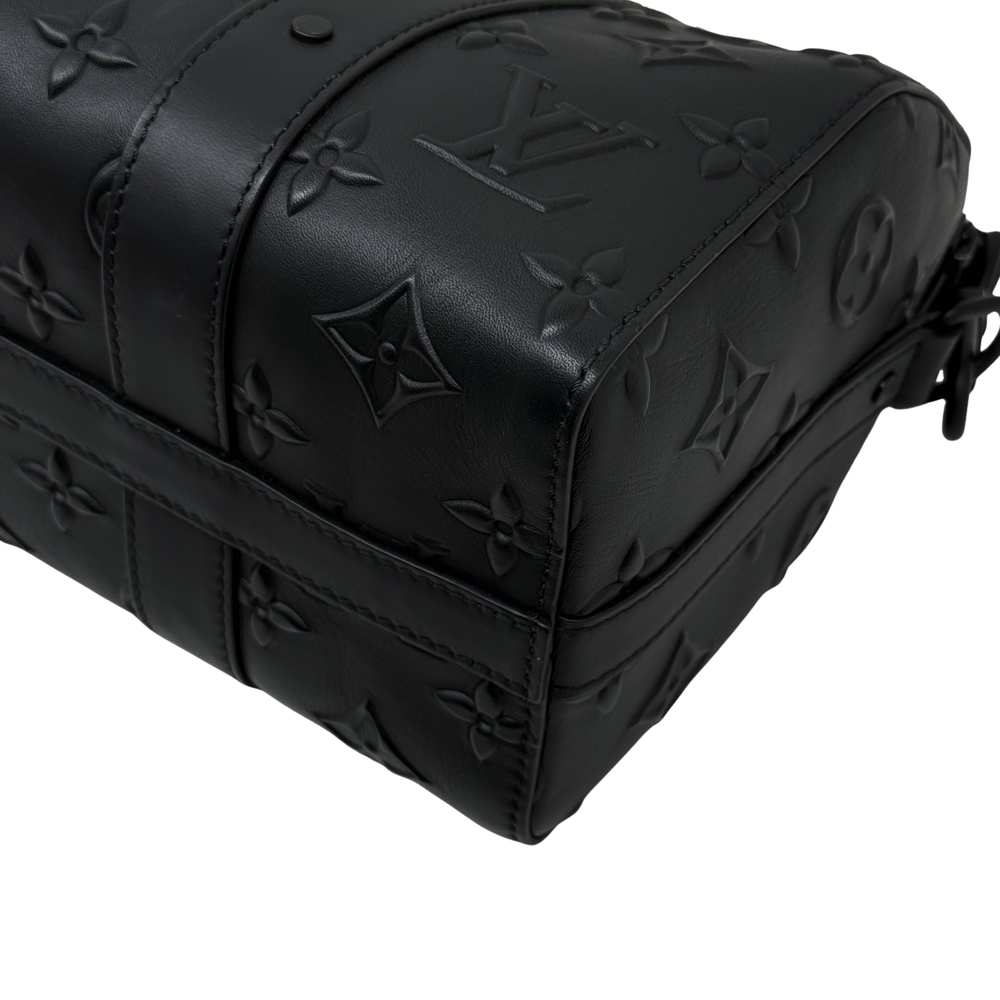Black Louis Vuitton monogram leather crossbody bag corner with embossed icons