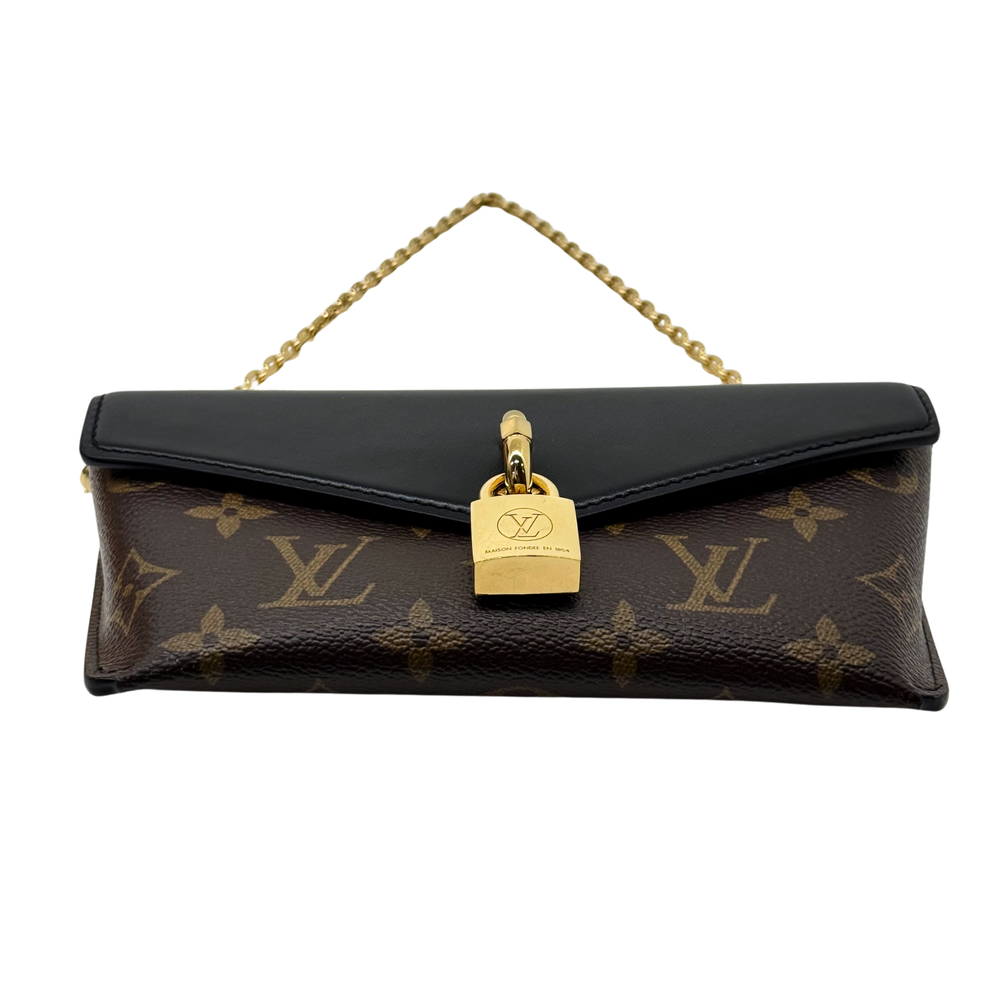 Monogram mini shoulder bag with black top flap and gold padlock clasp