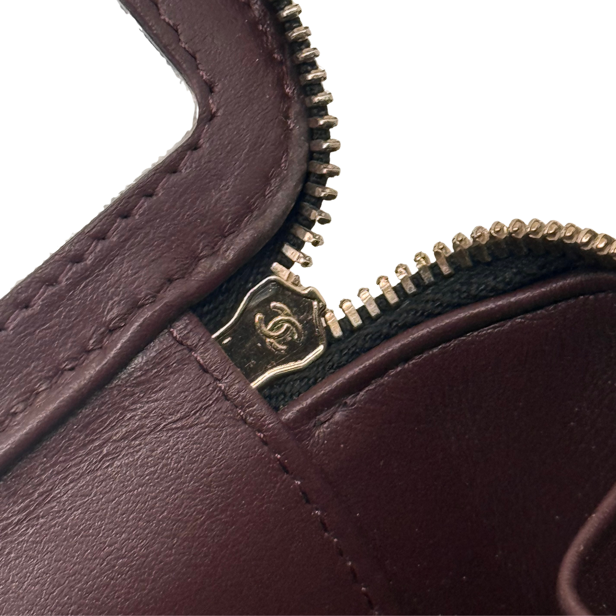 Pre-owned Chanel zipper pull and chain hardware on burgundy leather mini pouch