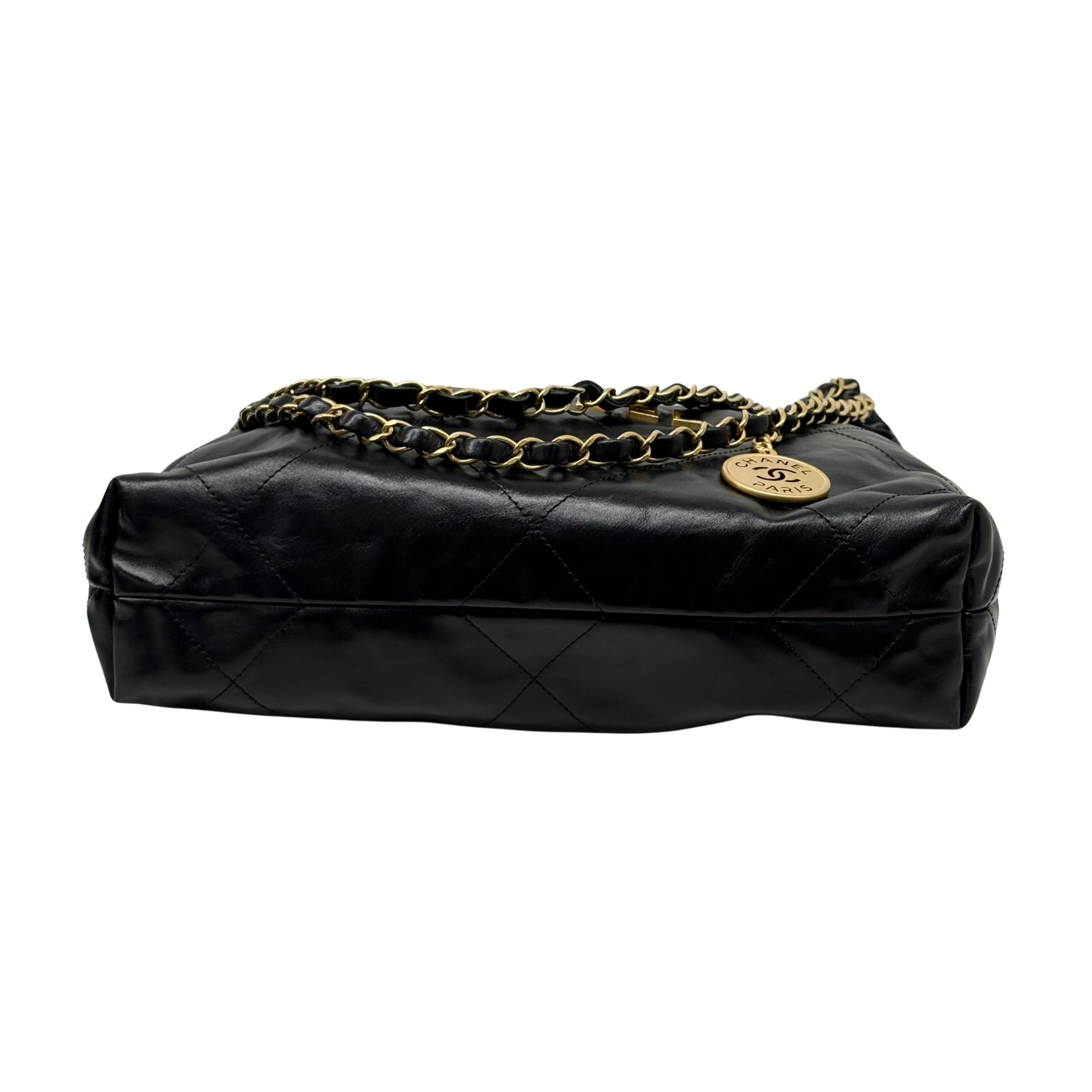 Black quilted leather shoulder bag with gold chain strap and round logo charm