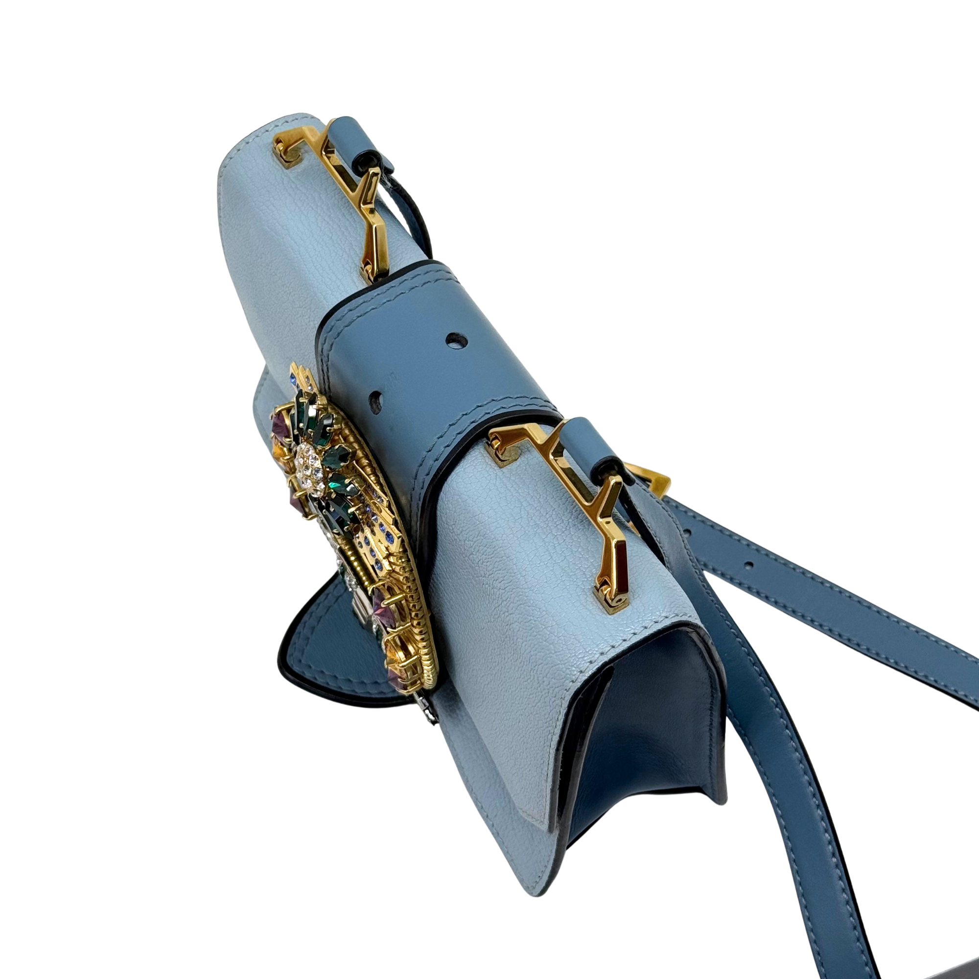 Pre-owned Miu Miu light blue bag with adjustable strap and gold clasp hardware