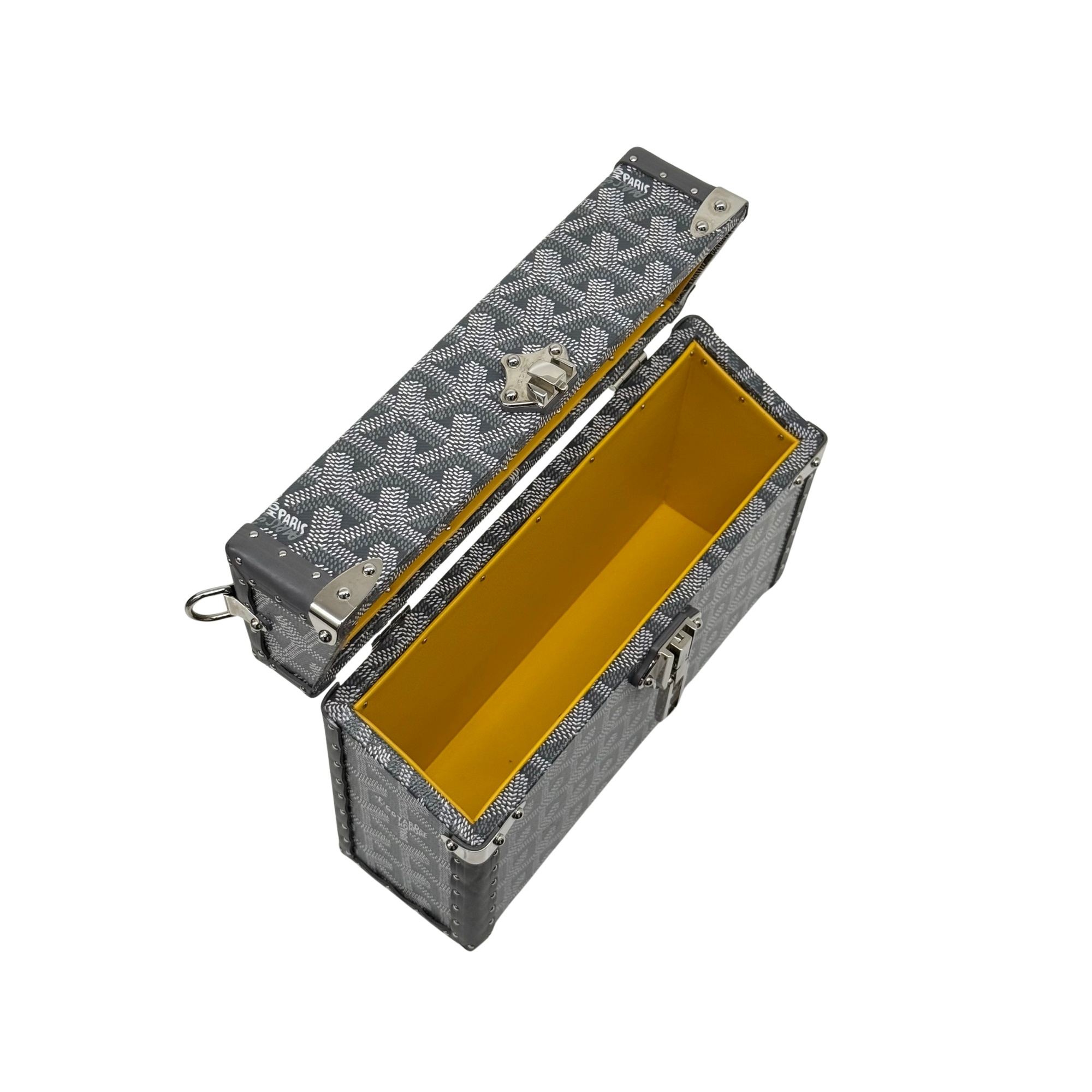 Goyard trunk side view with opened compartment and yellow interior panel, dark patterned body