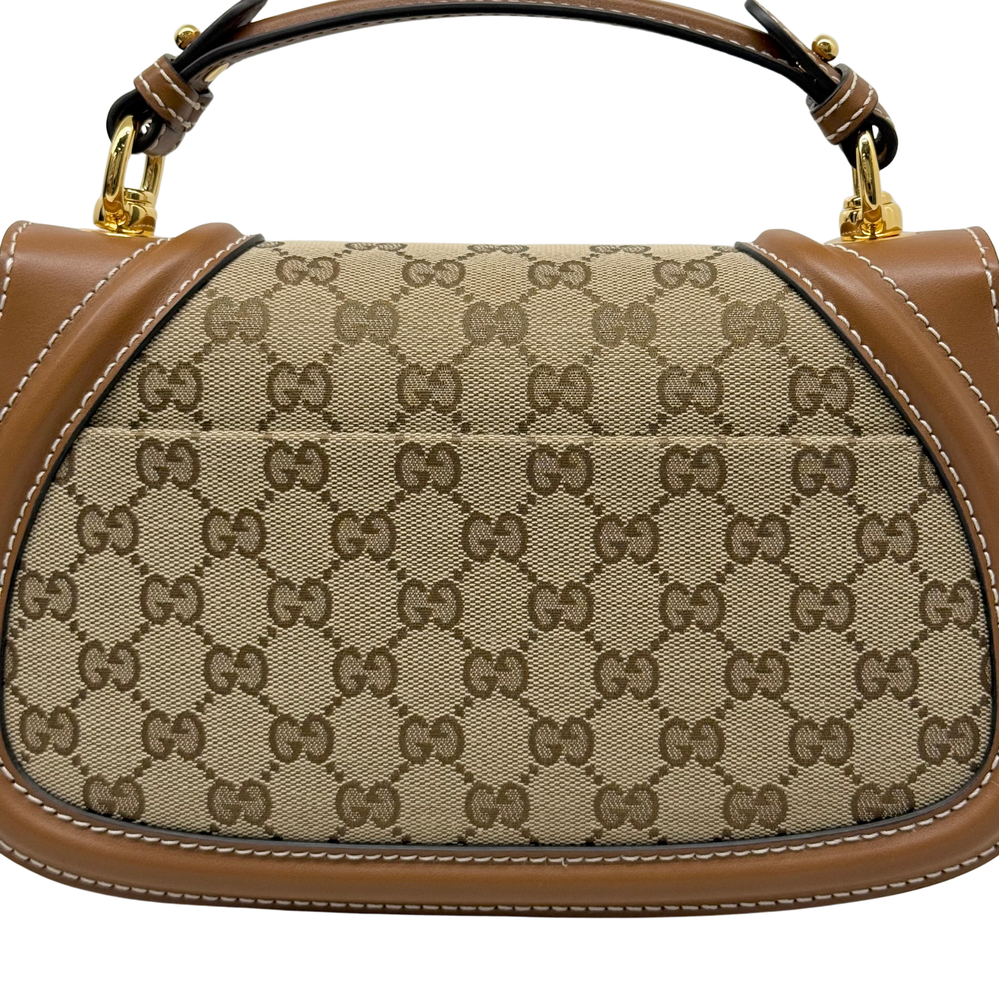Monogram canvas interior panel with tan leather edge trim