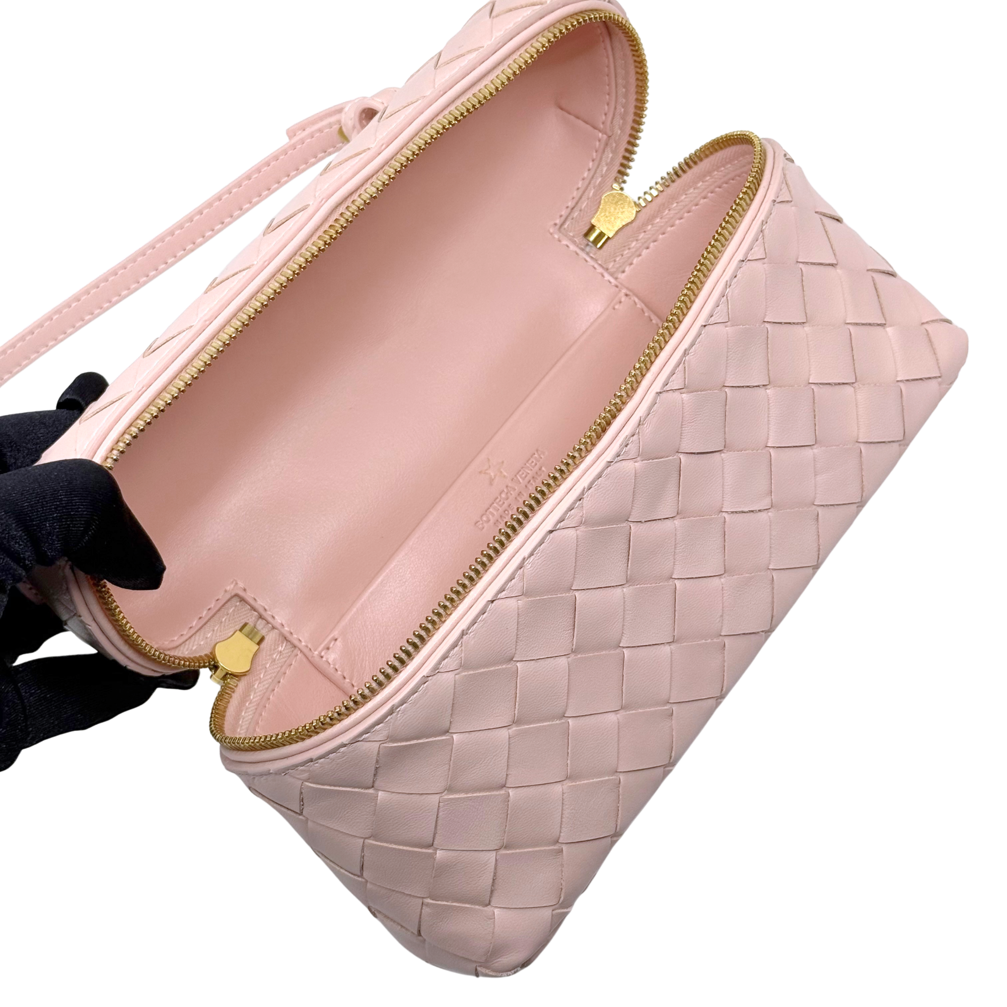 Bottega Veneta pale pink leather mini bag with woven pattern and gold zipper