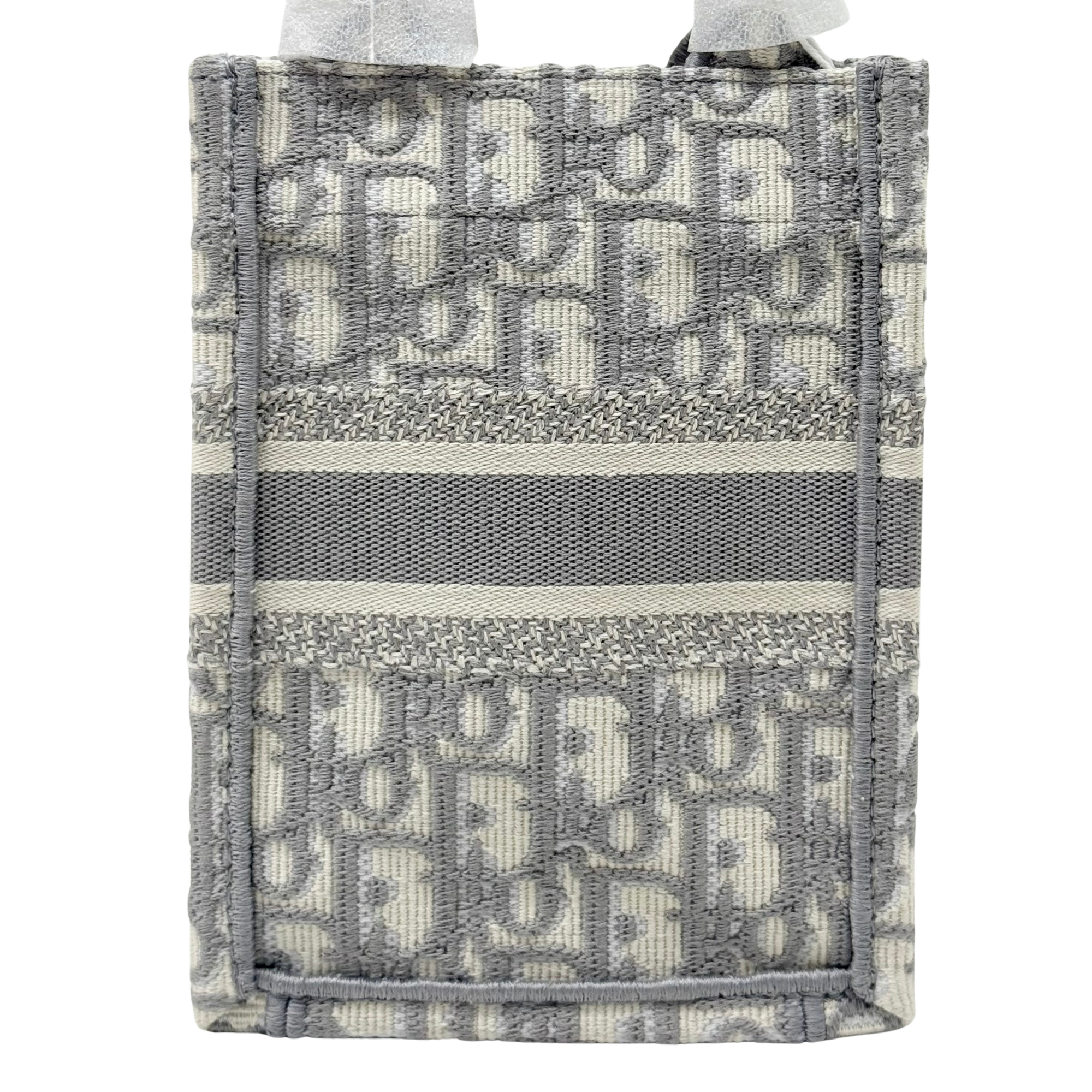 Gray Dior monogram tote bag with horizontal stripe panel and stitched frame