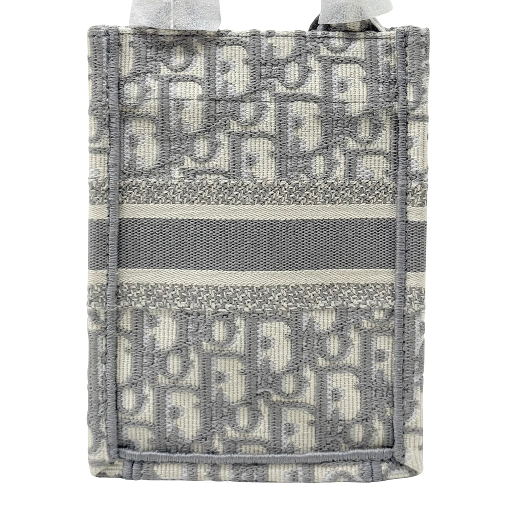 Gray Dior monogram tote bag with horizontal stripe panel and stitched frame