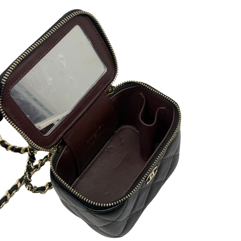 Pre-owned Chanel mini pouch open with clear card window, burgundy lining, zip top
