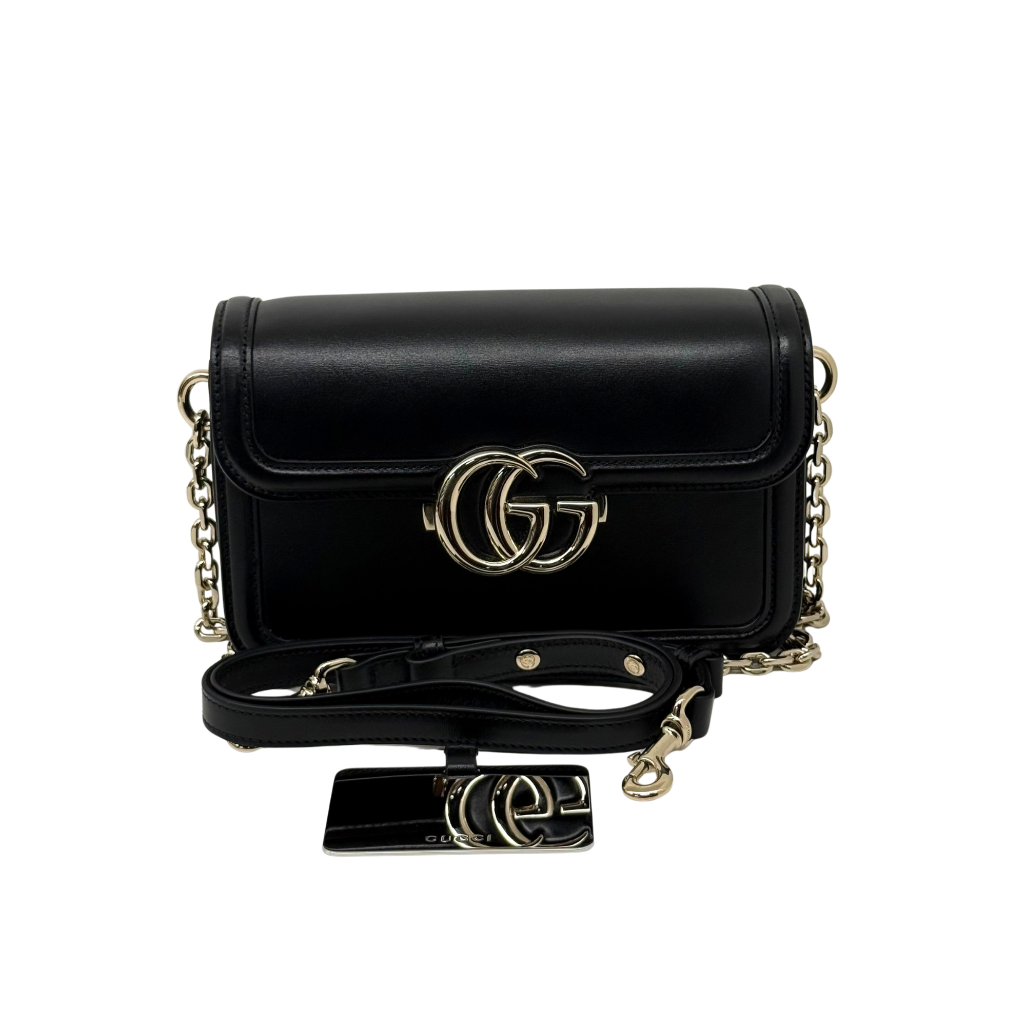 Black leather mini shoulder bag with gold-tone GG clasp and chain strap