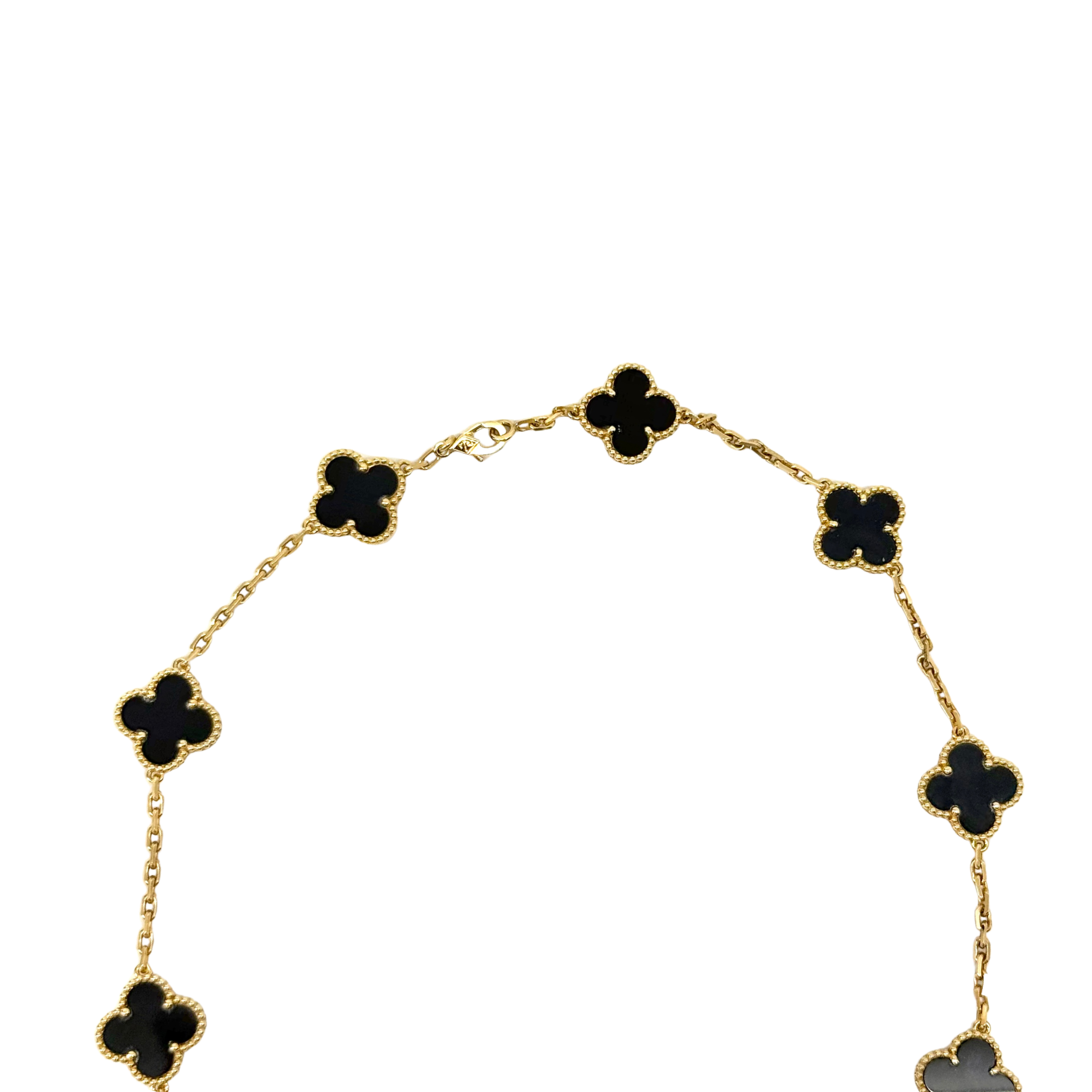Van Cleef clover necklace angled view with gold-tone chain and black four-leaf links