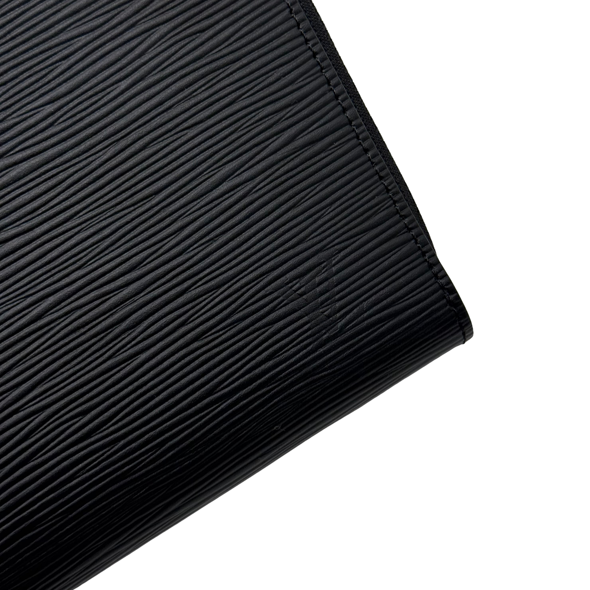 Louis Vuitton black leather wallet side with fine textured grain and stitched edge