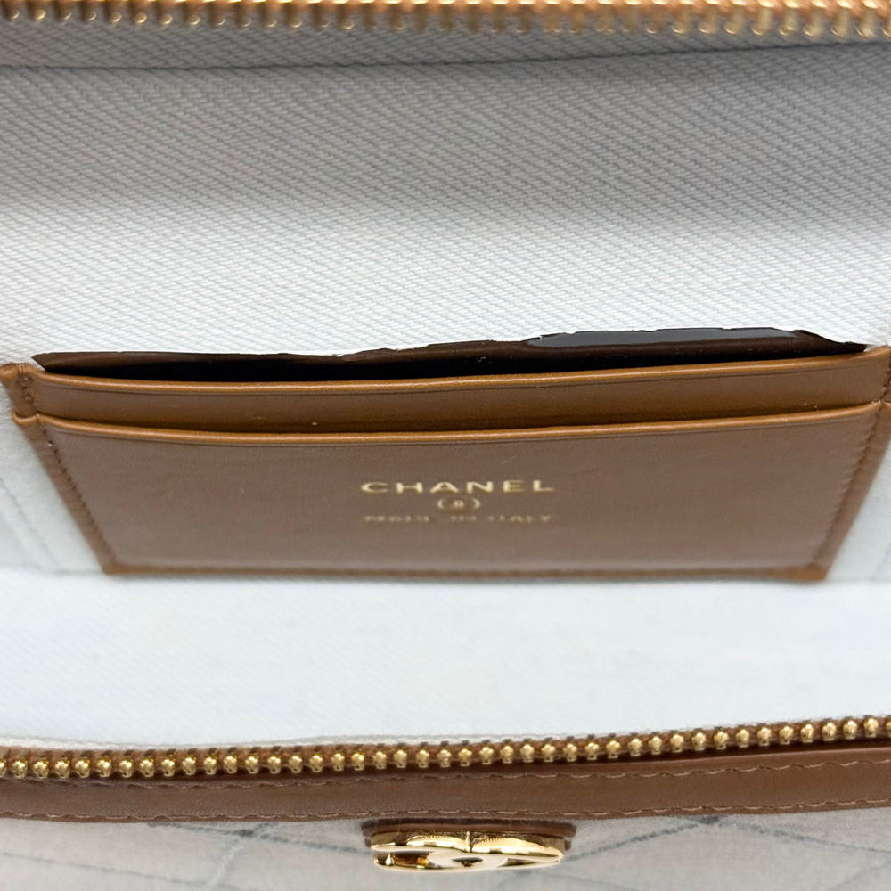 Chanel mini handbag interior label panel with gold-tone zipper and hardware